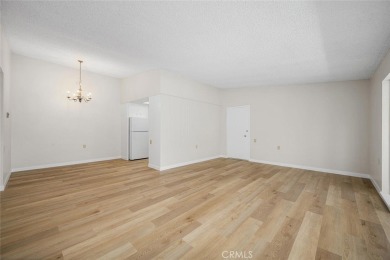 Private and move-in ready 2 bedroom 2 bathroom upstairs unit in on Leisure World Seal Beach Golf Course in California - for sale on GolfHomes.com, golf home, golf lot