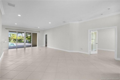 Beautiful and move-in ready CBS one-story pool home is privately on Eagle Marsh Golf Club in Florida - for sale on GolfHomes.com, golf home, golf lot