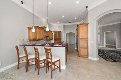This STUNNING home in the highly sought-after Gateway community on Gateway Golf and Country Club in Florida - for sale on GolfHomes.com, golf home, golf lot