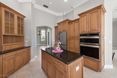 This STUNNING home in the highly sought-after Gateway community on Gateway Golf and Country Club in Florida - for sale on GolfHomes.com, golf home, golf lot