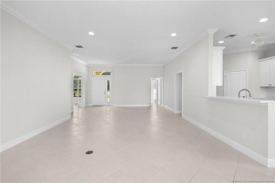 Beautiful and move-in ready CBS one-story pool home is privately on Eagle Marsh Golf Club in Florida - for sale on GolfHomes.com, golf home, golf lot