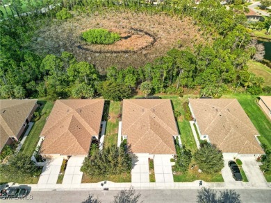 Enjoy a relaxed, low-maintenance lifestyle in this meticulously on Herons Glen Golf and Country Club in Florida - for sale on GolfHomes.com, golf home, golf lot