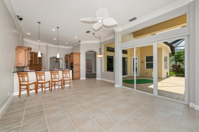 This STUNNING home in the highly sought-after Gateway community on Gateway Golf and Country Club in Florida - for sale on GolfHomes.com, golf home, golf lot
