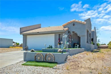 This Cozy 3 Bedroom, 2 Bath Home with Wood Burning Fire Place on Chaparral Golf and Country Club in Arizona - for sale on GolfHomes.com, golf home, golf lot