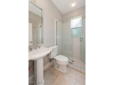 This STUNNING home in the highly sought-after Gateway community on Gateway Golf and Country Club in Florida - for sale on GolfHomes.com, golf home, golf lot