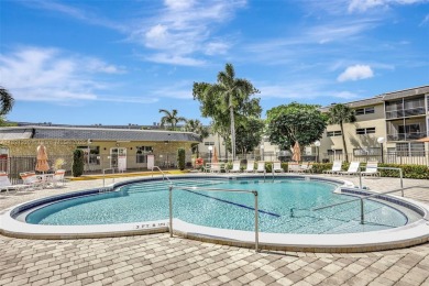Beautiful and fully furnished 2-bedroom unit on the first floor on Lauderhill Golf Course in Florida - for sale on GolfHomes.com, golf home, golf lot