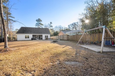 Like new, 2022 build, 4 bed/3  1/2  bath in Hagley Estates, with on The Founders Club At Pawleys Island in South Carolina - for sale on GolfHomes.com, golf home, golf lot