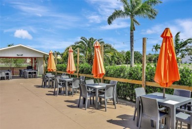 Beautiful and fully furnished 2-bedroom unit on the first floor on Lauderhill Golf Course in Florida - for sale on GolfHomes.com, golf home, golf lot