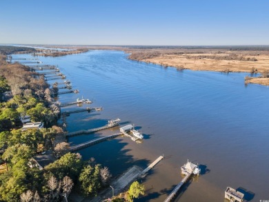 Like new, 2022 build, 4 bed/3  1/2  bath in Hagley Estates, with on The Founders Club At Pawleys Island in South Carolina - for sale on GolfHomes.com, golf home, golf lot