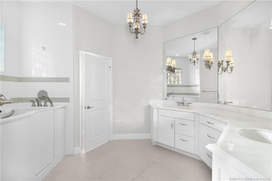 Beautiful and move-in ready CBS one-story pool home is privately on Eagle Marsh Golf Club in Florida - for sale on GolfHomes.com, golf home, golf lot