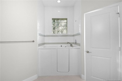 Beautiful and move-in ready CBS one-story pool home is privately on Eagle Marsh Golf Club in Florida - for sale on GolfHomes.com, golf home, golf lot