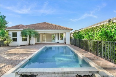 Beautiful and move-in ready CBS one-story pool home is privately on Eagle Marsh Golf Club in Florida - for sale on GolfHomes.com, golf home, golf lot