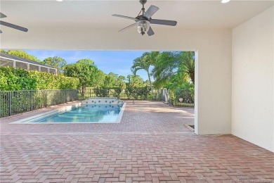 Beautiful and move-in ready CBS one-story pool home is privately on Eagle Marsh Golf Club in Florida - for sale on GolfHomes.com, golf home, golf lot