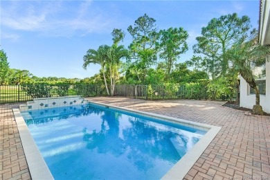 Beautiful and move-in ready CBS one-story pool home is privately on Eagle Marsh Golf Club in Florida - for sale on GolfHomes.com, golf home, golf lot