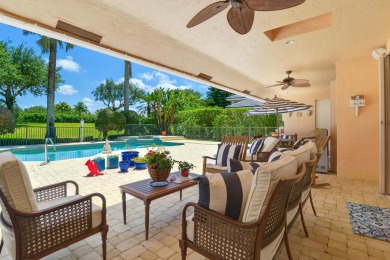 Beautifully appointed, welcoming home with split bedrooms and on Bocaire Country Club in Florida - for sale on GolfHomes.com, golf home, golf lot