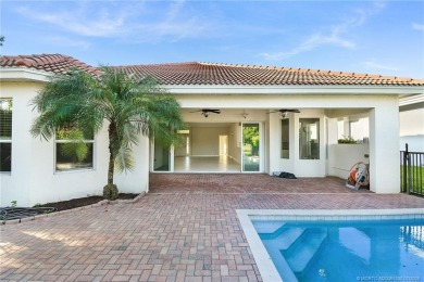 Beautiful and move-in ready CBS one-story pool home is privately on Eagle Marsh Golf Club in Florida - for sale on GolfHomes.com, golf home, golf lot