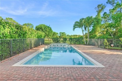 Beautiful and move-in ready CBS one-story pool home is privately on Eagle Marsh Golf Club in Florida - for sale on GolfHomes.com, golf home, golf lot