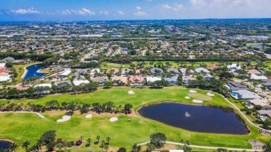 Beautifully appointed, welcoming home with split bedrooms and on Bocaire Country Club in Florida - for sale on GolfHomes.com, golf home, golf lot