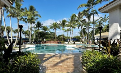 Beautifully appointed, welcoming home with split bedrooms and on Bocaire Country Club in Florida - for sale on GolfHomes.com, golf home, golf lot