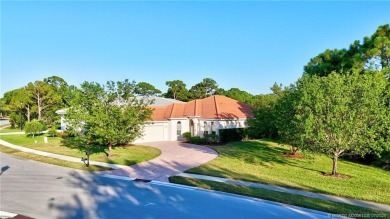 Beautiful and move-in ready CBS one-story pool home is privately on Eagle Marsh Golf Club in Florida - for sale on GolfHomes.com, golf home, golf lot