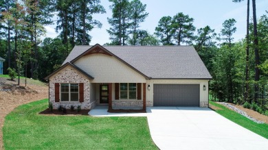 Perched atop the rolling hills that overlook the 9th hole of the on Monticello Golf Club At Savannah Lakes in South Carolina - for sale on GolfHomes.com, golf home, golf lot