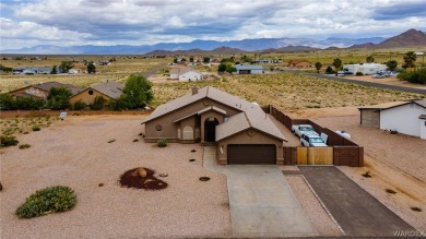 CLEAN HOME WITH STUNNING VIEWS, AND SITTING ON ( .40 ) OF AN on Valle Vista Golf Course in Arizona - for sale on GolfHomes.com, golf home, golf lot