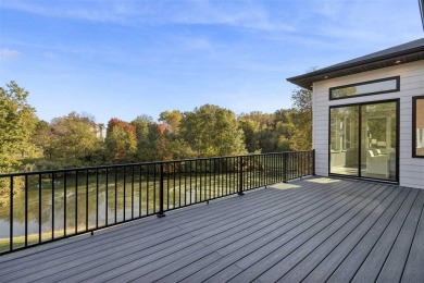 Enjoy this expansive open design with clean lines featuring some on Brown Deer Golf Club in Iowa - for sale on GolfHomes.com, golf home, golf lot