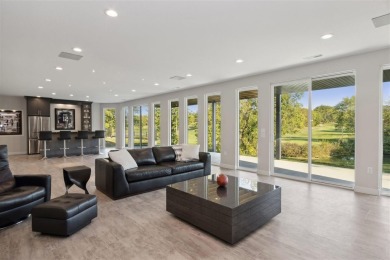 Enjoy this expansive open design with clean lines featuring some on Brown Deer Golf Club in Iowa - for sale on GolfHomes.com, golf home, golf lot