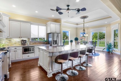 Discover an exceptional residence where sophisticated living on Hide-A-Way Lake Golf Course in Texas - for sale on GolfHomes.com, golf home, golf lot