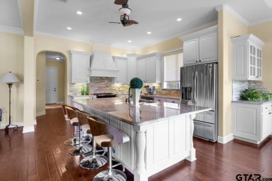 Discover an exceptional residence where sophisticated living on Hide-A-Way Lake Golf Course in Texas - for sale on GolfHomes.com, golf home, golf lot