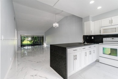 Great villa on the golf course, beautifully updated new kitchen on Colony West Country Club in Florida - for sale on GolfHomes.com, golf home, golf lot