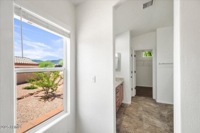 Set apart at the end of a cul-de-sac, this peaceful home boasts on Verde Santa Fe Golf Club in Arizona - for sale on GolfHomes.com, golf home, golf lot