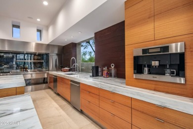 Experience unparalleled Desert Contemporary living in this on Desert Mountain Golf Club - Renegade Course in Arizona - for sale on GolfHomes.com, golf home, golf lot