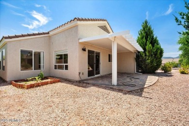 Set apart at the end of a cul-de-sac, this peaceful home boasts on Verde Santa Fe Golf Club in Arizona - for sale on GolfHomes.com, golf home, golf lot