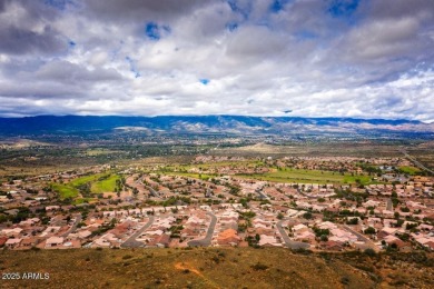 Set apart at the end of a cul-de-sac, this peaceful home boasts on Verde Santa Fe Golf Club in Arizona - for sale on GolfHomes.com, golf home, golf lot