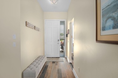 This beautifully laid-out home is ready for you to enjoy or use on Meadowood Golf and Tennis Club in Florida - for sale on GolfHomes.com, golf home, golf lot