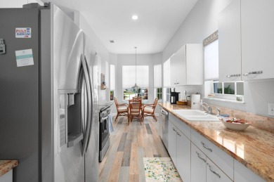 This beautifully laid-out home is ready for you to enjoy or use on Meadowood Golf and Tennis Club in Florida - for sale on GolfHomes.com, golf home, golf lot