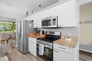 This beautifully laid-out home is ready for you to enjoy or use on Meadowood Golf and Tennis Club in Florida - for sale on GolfHomes.com, golf home, golf lot