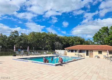 Enjoy panoramic unobstructed golf course & lake views with a on Cross Creek Country Club in Florida - for sale on GolfHomes.com, golf home, golf lot