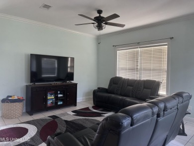 Nestled near the scenic Hickory Hills Golf Course, this charming on Mississippi National Golf Course in Mississippi - for sale on GolfHomes.com, golf home, golf lot