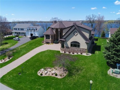 This home boasts almost 12,000 square feet and has everything on Geneva Golf Club in Minnesota - for sale on GolfHomes.com, golf home, golf lot