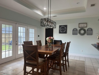 Nestled near the scenic Hickory Hills Golf Course, this charming on Mississippi National Golf Course in Mississippi - for sale on GolfHomes.com, golf home, golf lot