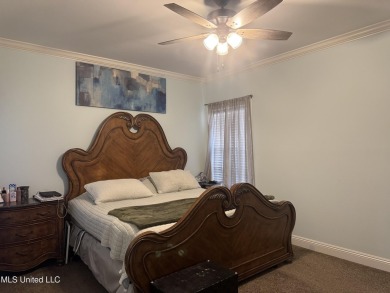 Nestled near the scenic Hickory Hills Golf Course, this charming on Mississippi National Golf Course in Mississippi - for sale on GolfHomes.com, golf home, golf lot