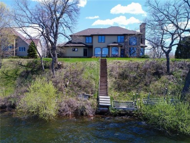 This home boasts almost 12,000 square feet and has everything on Geneva Golf Club in Minnesota - for sale on GolfHomes.com, golf home, golf lot