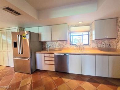 Enjoy panoramic unobstructed golf course & lake views with a on Cross Creek Country Club in Florida - for sale on GolfHomes.com, golf home, golf lot