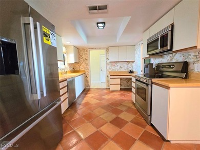 Enjoy panoramic unobstructed golf course & lake views with a on Cross Creek Country Club in Florida - for sale on GolfHomes.com, golf home, golf lot