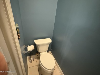 Nestled near the scenic Hickory Hills Golf Course, this charming on Mississippi National Golf Course in Mississippi - for sale on GolfHomes.com, golf home, golf lot