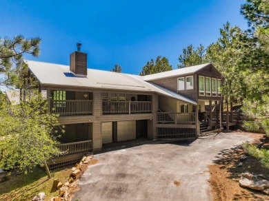 Nestled on an expansive 1.9-acre lot surrounded by whispering on Angel Fire Resort Country Club in New Mexico - for sale on GolfHomes.com, golf home, golf lot
