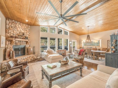 Nestled on an expansive 1.9-acre lot surrounded by whispering on Angel Fire Resort Country Club in New Mexico - for sale on GolfHomes.com, golf home, golf lot