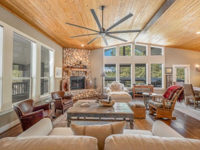 Nestled on an expansive 1.9-acre lot surrounded by whispering on Angel Fire Resort Country Club in New Mexico - for sale on GolfHomes.com, golf home, golf lot